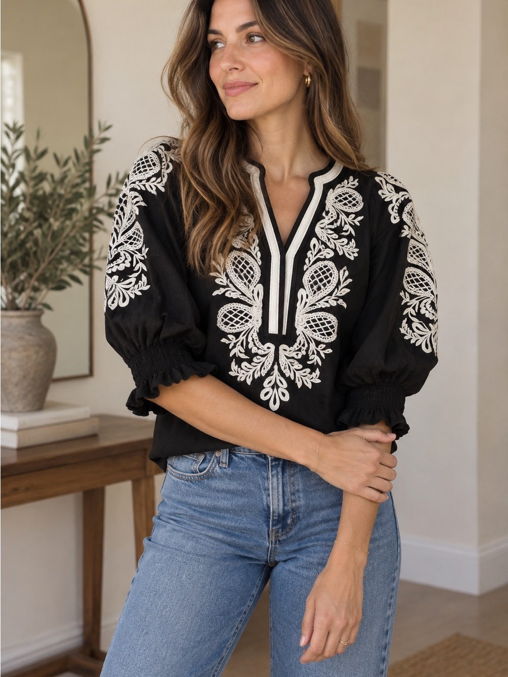 Maeve by Anthropologie embroidered black blouse in size Small.